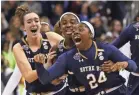  ?? AARON DOSTER/USA TODAY ?? Arike Ogunbowale (24) celebrates with teammates after hitting Notre Dame’s winning shot.