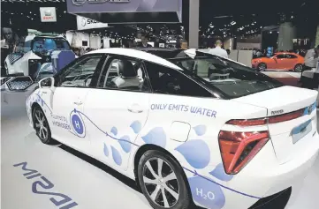  ??  ?? The Toyota Mirai, an hydrogen fuel cell vehicle, is displayed on media day at the Paris auto show, in Paris, France, Sept 29, 2016. — Reuters photo