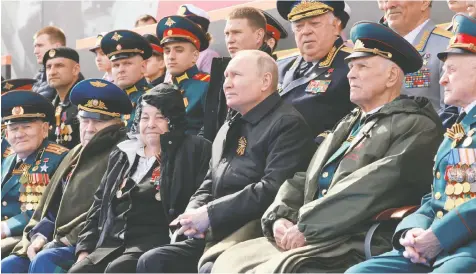  ?? — MIKHAIL METZEL/SPUTNIK/AFP ?? Russian President Vladimir Putin watches the Victory Day military parade at Red Square in central Moscow Monday. The event celebrates the victory over Nazi Germany in the Second World War.