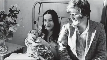  ??  ?? RIGHT: Mrs. Brigid Clifford, Waterville, with her husband Patrick and their 7lb 2 ounce baby girl, born five minutes into the 1982 New Year at Saint Finbarr’s Hospital, Cork.