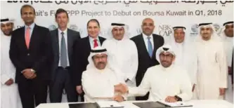  ??  ?? KUWAIT: The officials of Kuwait Authority for Partnershi­p Projects and NBK Capital during the signing ceremony. — KUNA