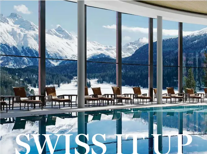  ??  ?? BADRUTT’S PALACE, A CASTLELIKE HOTEL CLINGING TO THE MOUNTAIN IN ST. MORITZ, EXCELS IN EXTRAVAGAN­CE.