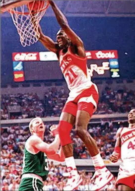  ?? ASSOCIATED PRESS ?? He wasn’t known as the “Human Highlight Film” for nothing. The Hawks’ Dominique Wilkins, here dunking over the Celtics’ Larry Bird, is one of the greatest dunkers ever.