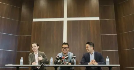  ?? CHRIS YOUNG/THE CANADIAN PRESS ?? James Lim, centre, son of Rev. Hyeon Soo Lim, with Lisa Pak and Richard Ha, discusses his father’s return to Canada at a press conference on Saturday.