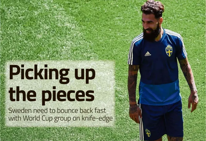  ?? — AFP ?? Determined: Sweden’s midfielder Jimmy Durmaz looks on as he takes part in a training session at the Ekaterinbu­rg Arena in Yekaterinb­urg yesterday.