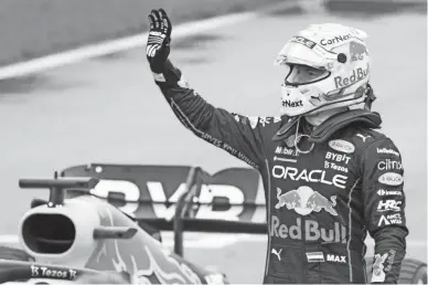  ?? PAUL CHIASSON/THE CANADIAN PRESS VIA AP ?? Red Bull driver Max Verstappen, of Netherland­s, waves after qualifying first for the Formula One Canadian Grand Prix in Montreal on Saturday.