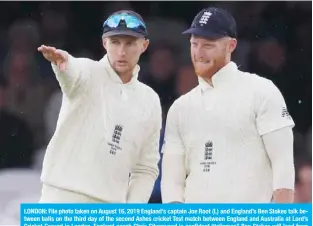  ??  ?? LONDON: File photo taken on August 16, 2019 England’s captain Joe Root (L) and England’s Ben Stokes talk between balls on the third day of the second Ashes cricket Test match between England and Australia at Lord’s Cricket Ground in London. England coach Chris Silverwood is confident “talisman” Ben Stokes will lead from the front in Joe Root’s absence during next week’s first Test against the West Indies. — AFP