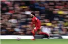  ?? Photograph: David Klein/Reuters ?? Liverpool’s Mohamed Salah surges forward against Watford.