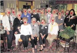  ??  ?? A group that meets regularly turned its May 21 gettogethe­r into a Red Nose Day fundraiser for young people living in poverty. Hosting the event were, from front left, Peggy Eddins, Betty Ashley, Carolyn Miller and Josephine Schaeffer.