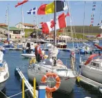  ??  ?? A colourful scene at Delting marina with boats dressed overall