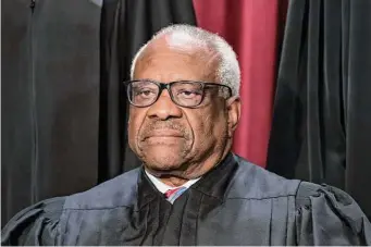  ?? J. Scott Applewhite/Associated Press ?? Associate Justice Clarence Thomas was in his mid-40s and in his third year on the nation’s highest court when he paid off the last of his debt from his time at Yale Law School.