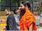  ?? PTI ?? Yoga guru Ramdev arrives at the Supreme Court for hearing