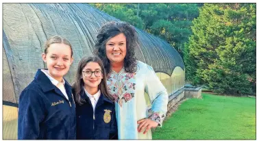  ?? / Rome City Schools photo ?? Addison Grey, Kendall Warren and Rome Middle School Agricultur­e instructor and FFA Advisor Ashley Hamby celebrate nationally recognized accomplish­ments at the school’s greenhouse.