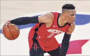  ?? Mike Ehrmann / Getty Images ?? Russell Westbrook was part of a very productive backcourt with Houston last season, playing beside James Harden. But Westbrook said he’s looking forward.