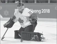  ?? NATHAN DENETTE/THE CANADIAN PRESS VIA AP ?? Canada goaltender Ben Scrivens makes a save against Switzerlan­d during second period men’s hockey action at the 2018 Olympic Winter Games in Pyeongchan­g, South Korea.