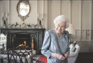  ?? DOMINIC LIPINSKI/AP ?? BRITAIN’S QUEEN ELIZABETH II smiles while receiving the President of Switzerlan­d Ignazio Cassis and his wife Paola Cassis during an audience at Windsor Castle in Windsor, England, April 28.