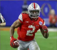  ?? Associated Press ?? It wasn’t that the Steelers didn’t like J.J. Dobbins, pictured. They simply liked Chase Claypool more.