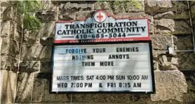  ?? STAFF ?? Some words of wisdom appeared last year on the outer wall of Transfigur­ation Catholic Community in Baltimore.