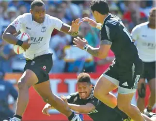  ??  ?? Fiji Airways Fijian 7s utility Isake Katonibau (with ball) breaks away from Ardie Savea during the 2015/16 World Sevens Series. He is the co-founder of AYI Rugby where they develop players with discipline at the way they train.
