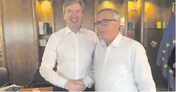  ??  ?? INM editor-in-chief Stephen Rae with Jean Claude Juncker