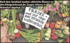  ?? ?? Nach dem Amoklauf wurden zahlreiche Blumen vor dem Königreich­ssaal der Zeugen Jehovas in Alsterdorf abgelegt.