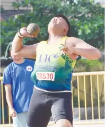  ?? SUNSTAR FOTO/ RUEL ROSELLO ?? GOLDEN THROW. Jan Moises Estrada added a gold medal for UC in the men’s shot put event.