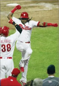  ?? TOM MIHALEK — THE ASSOCIATED PRESS ?? Phillies third baseman Maikel Franco celebrates a solo home run in the fifth inning Saturday night at Citizens Bank Park. It was the only reason for an offensive celebratio­n in a 4-1 loss to the Braves.