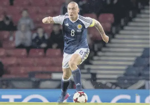  ??  ?? Scott Brown captained Scotland against Slovenia on Sunday but there is no guarantee he will face England at Hampden in June.