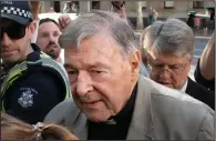  ?? (AP/Andy Brownbill) ?? Cardinal George Pell is shown last year as he arrives for a hearing at the County Court in Melbourne, Australia.