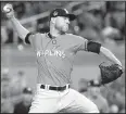  ?? AP file photo ?? Right-hander David Phelps was traded by the Miami Marlins on Thursday to the Seattle Mariners for four prospects, including highly regarded outfielder Brayan Hernandez. Phelps is 2-4 with a 3.45 ERA in 44 relief appearance­s this season.