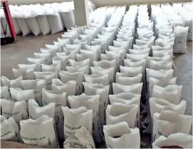  ??  ?? File picture of Red Nadu rice packs ready to be dispatched. Rice farming is no more a lucrative or efficient sector in Sri Lanka's economy.