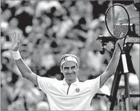  ?? MIKE HEWITT/GETTY ?? Roger Federer celebrates after his four-set victory over Kei Nishikori on Wednesday.