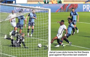  ??  ?? Jamal Lowe slots home his first Swans goal against Wycombe last weekend