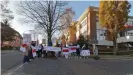  ??  ?? Belarusian demonstrat­ors have protested outside the firm Hauni in Hamburg