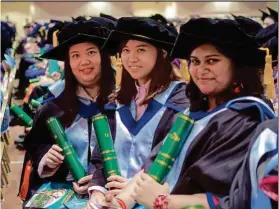  ??  ?? FBF postgradua­tes with their scrolls during the convocatio­n on Aug 21 at Dewan Tun Ling Liong Sik, UTAR.