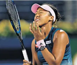  ??  ?? Feeling it: Naomi Osaka looks distraught as she loses in Dubai on Tuesday after the split from her coach