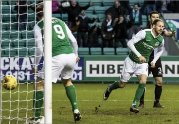  ??  ?? EARLY STARTER: Martin Boyle wheels away after opening the scoring in the sixth minute at Easter Road