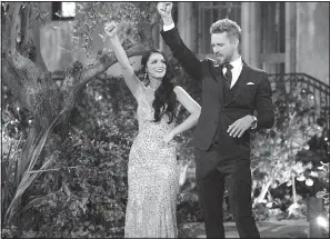  ?? Bachelor in Paradise. ?? Arkansas’ Raven Gates teaches Nick Viall to call the Hogs on his season of ABC’s The Bachelor. Gates finished as runner-up and will look for love on