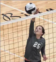  ?? Tommy Romanach / Rome News-Tribune ?? Pepperell’s Taylor Carles attacks the ball at the net.