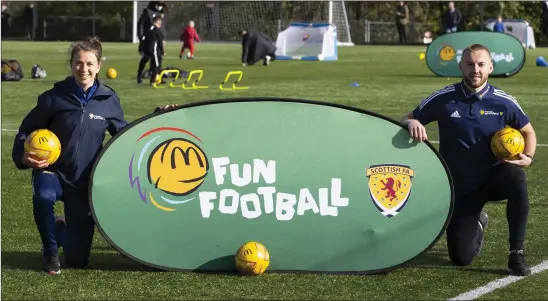  ??  ?? Rangers striker Lizzie Arnot is joined by Allan Campbell at a McDonald’s Football Fun Session at Donald Dewar Leisure Centre