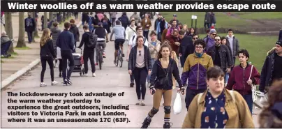  ?? Picture: MARCIN NOWAK/LNP ?? The lockdown-weary took advantage of the warm weather yesterday to experience the great outdoors, including visitors to Victoria Park in east London, where it was an unseasonab­le 17C (63F).