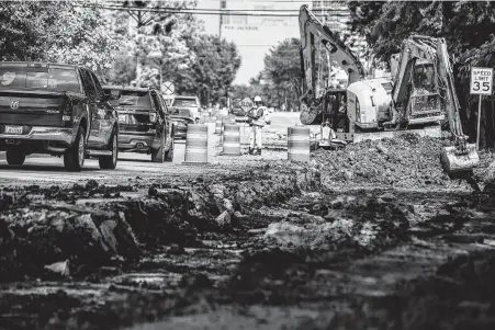  ?? Brett Coomer / Staff photograph­er ?? Constructi­on continues on Richmond Avenue just east of Loop 610. Public Works officials have estimated Houston should spend at least $650 million each year on street and drainage projects. The city never has spent even close to half that amount.