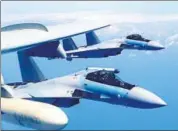  ?? AP ?? China says US has no right to interfere in its Russian jet deal.