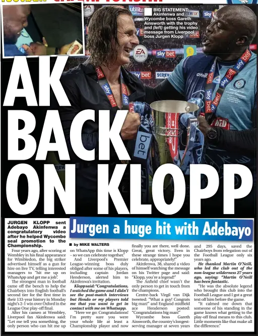  ??  ?? ■
BIG STATEMENT: Akinfenwa and Wycombe boss Gareth Ainsworth with the trophy and (left) getting his video message from Liverpool boss Jurgen Klopp