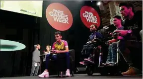  ??  ?? Des binômes handis-valides lors de la compétitio­n CapGame Arena, en 2018.