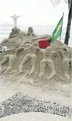  ??  ?? Angel Maluleke, the South African constable who was bust in Sao Paulo allegedly trying to smuggle out cocaine, posted this photo of a beach sand sculpture in Brazil on her Facebook page.