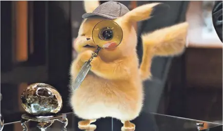  ?? WARNER BROS. PICTURES ?? If you look closely, you can see Ryan Reynolds’ micro-facial expression­s on Detective Pikachu.