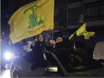  ?? EPA ?? Supporters of Hezbollah took their party flags to the streets of Lebanese cities on Sunday in anticipati­on of election success as voters vent anger against the country’s crisis