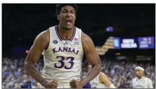  ?? (AP/David J. Phillip) ?? Kansas forward David McCormack helped lead the Jayhawks to their first national title in men’s basketball since 2008 in April. At least one Kansas athlete from all 18 sports had at least one Name, Image and Likeness deal, according to a news release from the school.