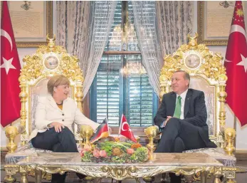  ?? FOTO: DPA ?? Bundeskanz­lerin Angela Merkel (CDU) und der türkische Staatspräs­ident Recep Tayyip Erdogan.